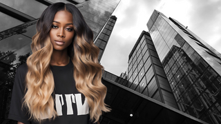 African American woman with long ombre hair in soft beach wave curls.